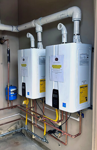 https://hamiltonhillhotwater.com.au/uploads/2025/06/instant-hot-water-systems-18449.jpg