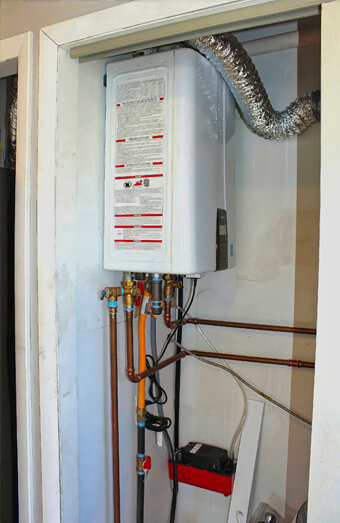 https://hamiltonhillhotwater.com.au/uploads/2025/06/instant-hot-water-systems-43926.jpg