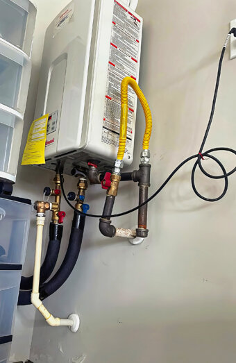 https://hamiltonhillhotwater.com.au/uploads/2025/06/instant-hot-water-systems-65049.jpg