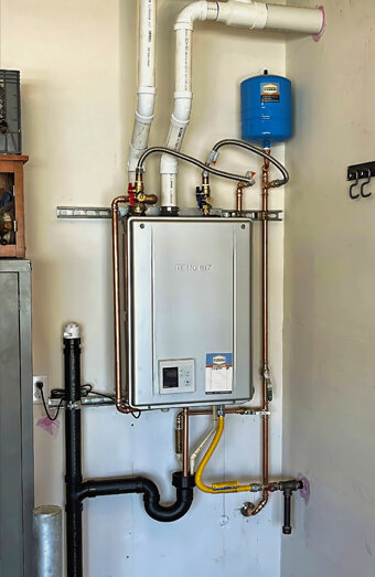 https://hamiltonhillhotwater.com.au/uploads/2025/06/instant-hot-water-systems-98444.jpg